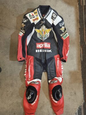 various race leathers, clothing, memrobilia